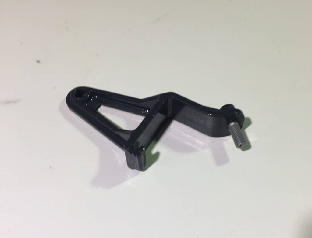 Front shaker rod support, P16063